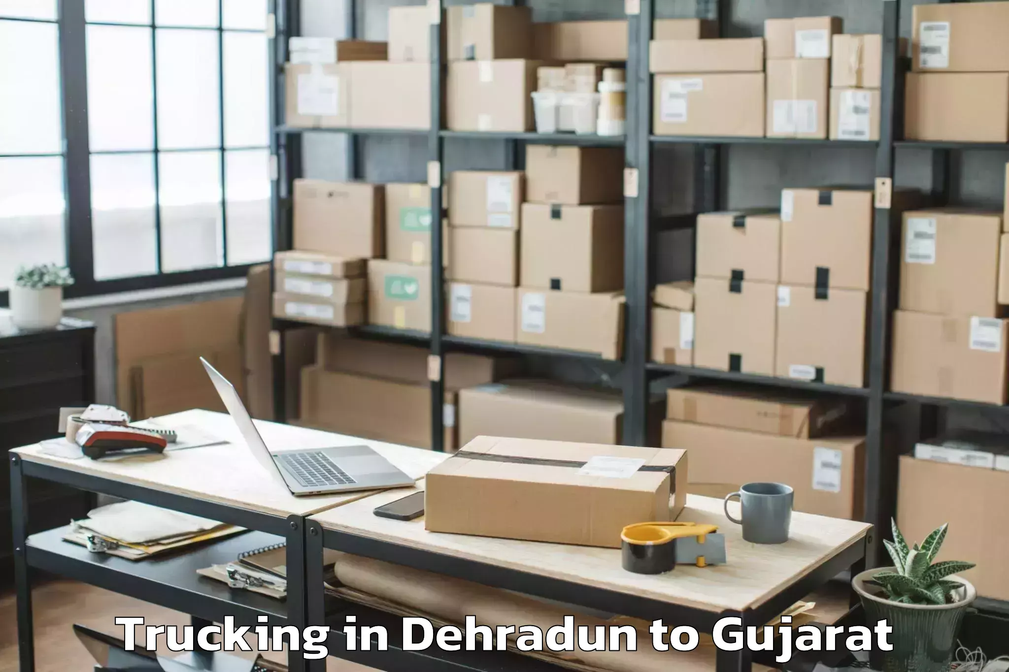 Easy Dehradun to Paliyad Trucking Booking